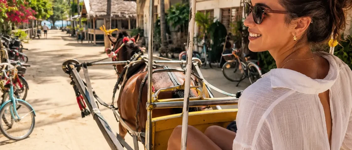 Woman smile going on with cidomo around gili trawangan