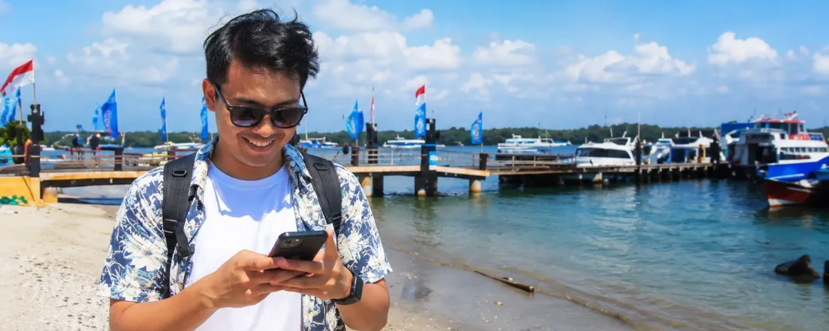 asian traveller at serangan port